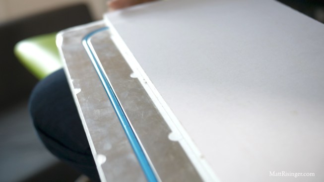 This is the back of a drywall radiant panel. The tubes are embedded in metal to spread the cold out to a larger surface area.