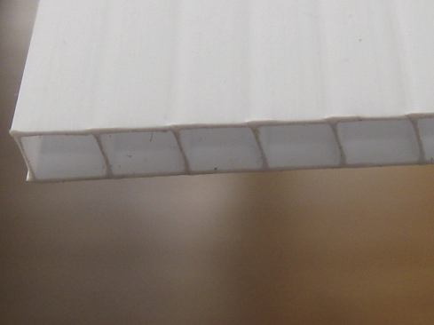 Coroplast is a sheet product that has continuous parallel flutes along its length. In a 3/8-inch thickness, it can be used to form an excellent rainscreen.