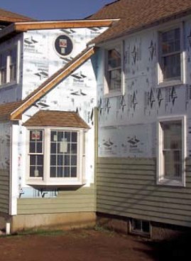 Contractor Craig Caulkins of Caulkins Building & Design in Niantic, Conn., routinely applies 1/2-inch or 1-inch Dow Styrofoam to home exteriors under vinyl siding.
