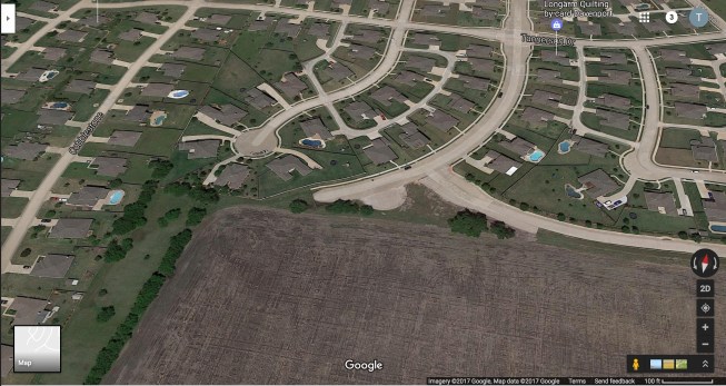 A recent Google Earth view of the homes on Panhandle Drive in Rockwall, Texas, before they were totaled by 95-mph winds. A large field to the south of the location would have provided no protection from the full force of the winds.