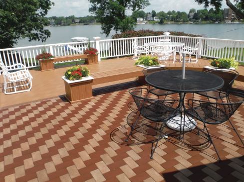 On this project, the author picture-framed the pavers with a composite-decking border.