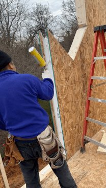 Each 6 1/2-inch-thick panel was manufactured to exact specifications and labeled for its location and sequence in the installation process. The panels arrive with horizontal and vertical ducts ready for electrical wiring. During installation, panels are sealed on all four sides with either spray foam or SIP seal adhesives, depending on the connection.