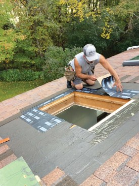 I sealed the opening in the roof deck to the roofing underlayment with 12-inch-wide strips of Vycor Plus self-adhering flashing membrane.
