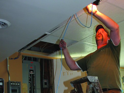 Ritz runs Cat-6 wire from the inverter’s hub to a modem in the homeowner's home office. Ethernet (Cat-5, Cat-6), WiFi, or 4G cellular are available for local network communication, though ethernet provides the most reliable connection. From the home’s modem, power company technicians can remotely communicate with and control the battery and the inverter. It alerts them to any performance issues, malfunctions, as well as allowing for routine firmware installations.