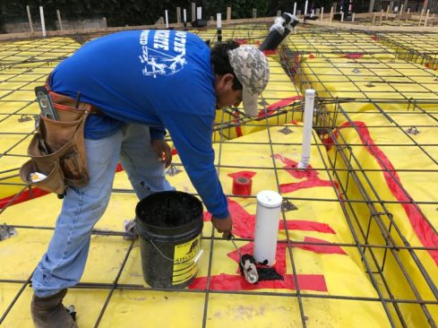 My concrete guy is using Stego Mastic on the pipe penetrations for extra precaution. This is like a thinned “caulk” that we roll on.