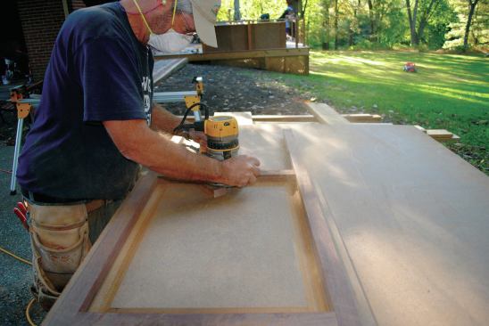 Cutting a raised-panel design in the cabinet sides was a bit more involved. I used a Whiteside panel bit (whitesiderouterbits.com) fitted with a bearing above the cutter and a template frame to guide the cut. Because of the depth of cut for the panel, I had to use 1 ¼-inch-thick material for the frame.