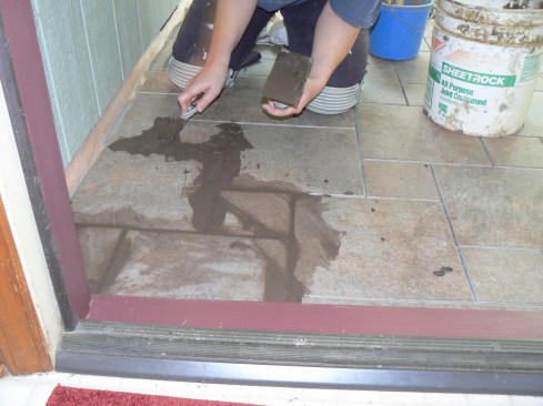 After the tile was set,the joints were grouted with a sanded grout, using standard tile-setting techniques.