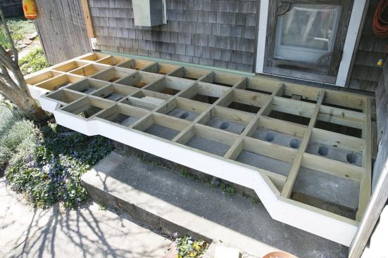 Where the band joist stepped out for each section of the curve, I added 45-degree transitions between the projections, then finished off with PVC trim.