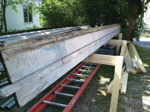 Much of the trim had deteriorated beyond saving. As the exterior layers were peeled back, any of the original cyprus trim that still had life was set aside to be reinstalled later.