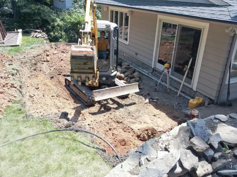 Because of the tight site, the excavated dirt had to be hauled away.