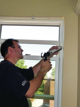 Beads of caulk between the trim and the drywall and along the reveal created at the jamb complete the interior finish.