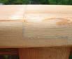 Cedar cap rail was routed on all four edges, and joints were half-lapped together with exterior adhesive and stainless steel screws. All fasteners were installed from below. Screw holes were plugged and sanded, leaving little trace of the mechanical connection.