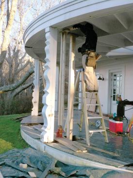 The author and his crew set up temporary supports for the porch roof so that they could remove and repair the sculpted columns.