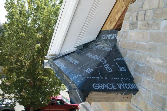 We covered the OSB caps with peel-and-stick membrane. We would install the reglet flashings later.