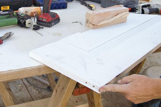 . . . and the fluted soffits, which we mitered, glued, and screwed together at the outside corners.