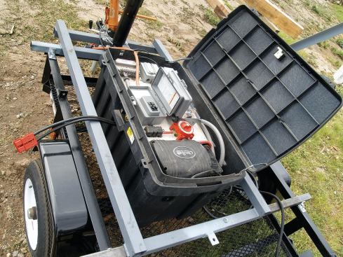 Everything is mounted on a small trailer.