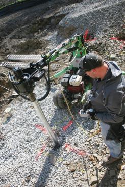 Hydraulically driven helical piles
(photo above) are typically
installed by subcontractors who use torque readings to achieve the required
bearing capacity in a variety of soils. (For more information, see Working with
Helical Piles)