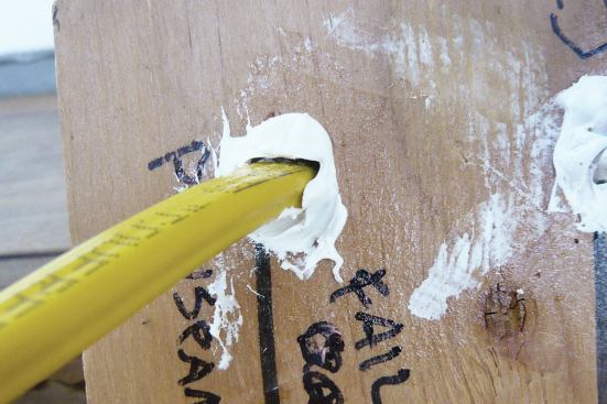 Caulks that failed the wire-movement tests typically remained bonded to the plywood but separated visibly from the outer sheathing of the cable.
