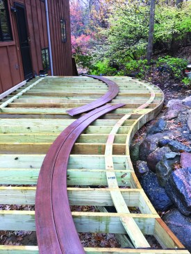 After the joists were marked and cut to length, workers installed blocking as needed.