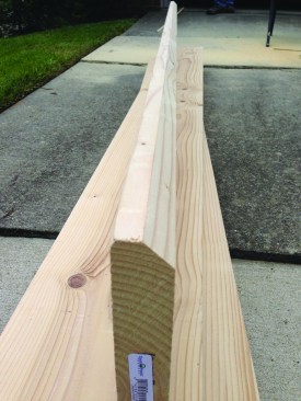 To simplify getting these new joists between the sill plate and the floor, the author first rip-beveled one edge for the length of the joist.