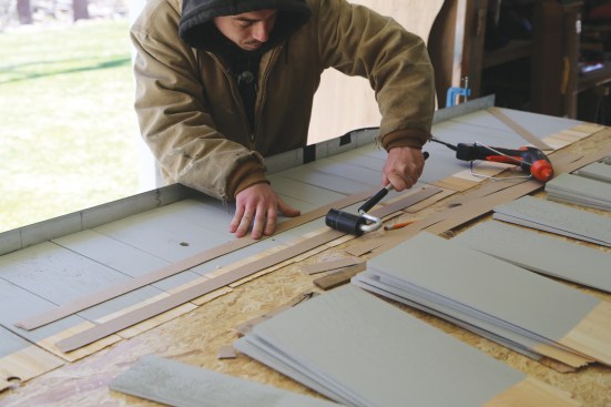 Applying pressure with a roller improves adhesion.