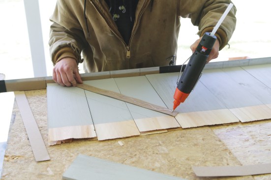 The shims are glued on the diagonal to match the rake.