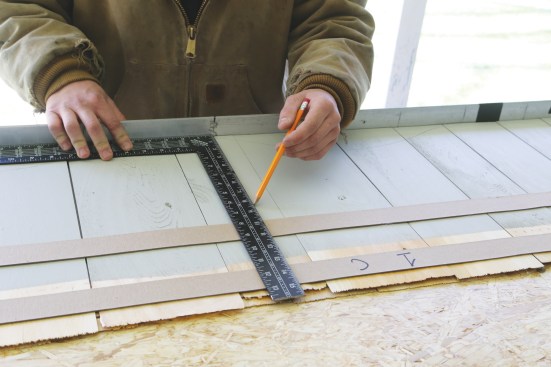 ... a worker marks the centerline.
