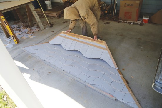 Laying the shingle strips out on the shop floor allows them to be checked for mistakes prior to delivery to the jobsite.