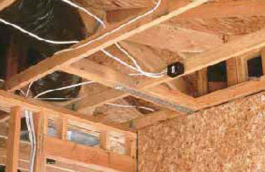 However, since the blocking doesn’t extend to the roof, where it could connect to the sheathing, it will do a poor job of transferring diaphragm forces from the roof to the shear wall.