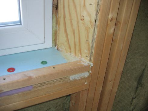 I installed 1 1/2-by-2-inch nailers to the front edge of the sill to provide a good screw base for the interior drywall.