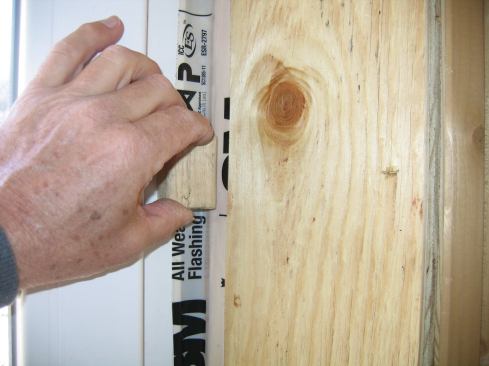 A scrap block pushed the tape into the intersections and smoothed out possible wrinkles.