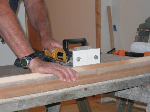 To cut slots for the biscuits, I  adapted the fence to my plate joiner with a piece of 1/4-inch plywood to get the depth of cut I needed.