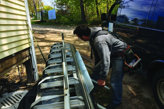 Pollard custom-bent lengths of zinc flashing.