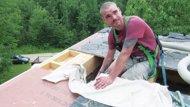 Typical weatherizing jobs don't require roof demolition, but in this case, sheathing had to be replaced because of condensation and moisture damage.