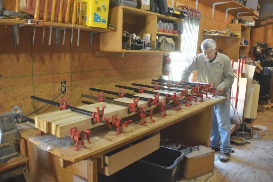 The planed lumber is glued up into parts for the stiles and rails. Planing them first ensures a clean and flat surface.